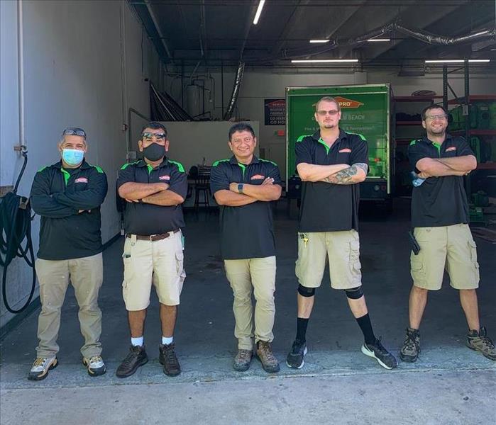 SERVPRO techs standing on our Boca Raton, FL warehouse