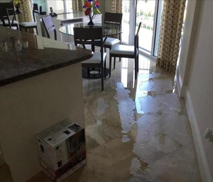wet floor in kitchen area due to heavy rains
