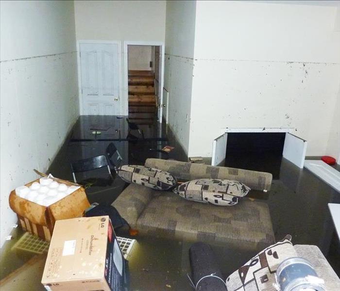 Completely flooded basement. Visible line showing maximum water level higher than 7 feet.